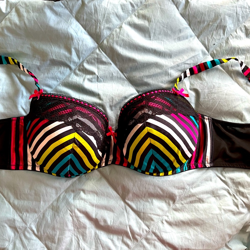 Cacique bra 40DD rainbow stripe with pink bows.